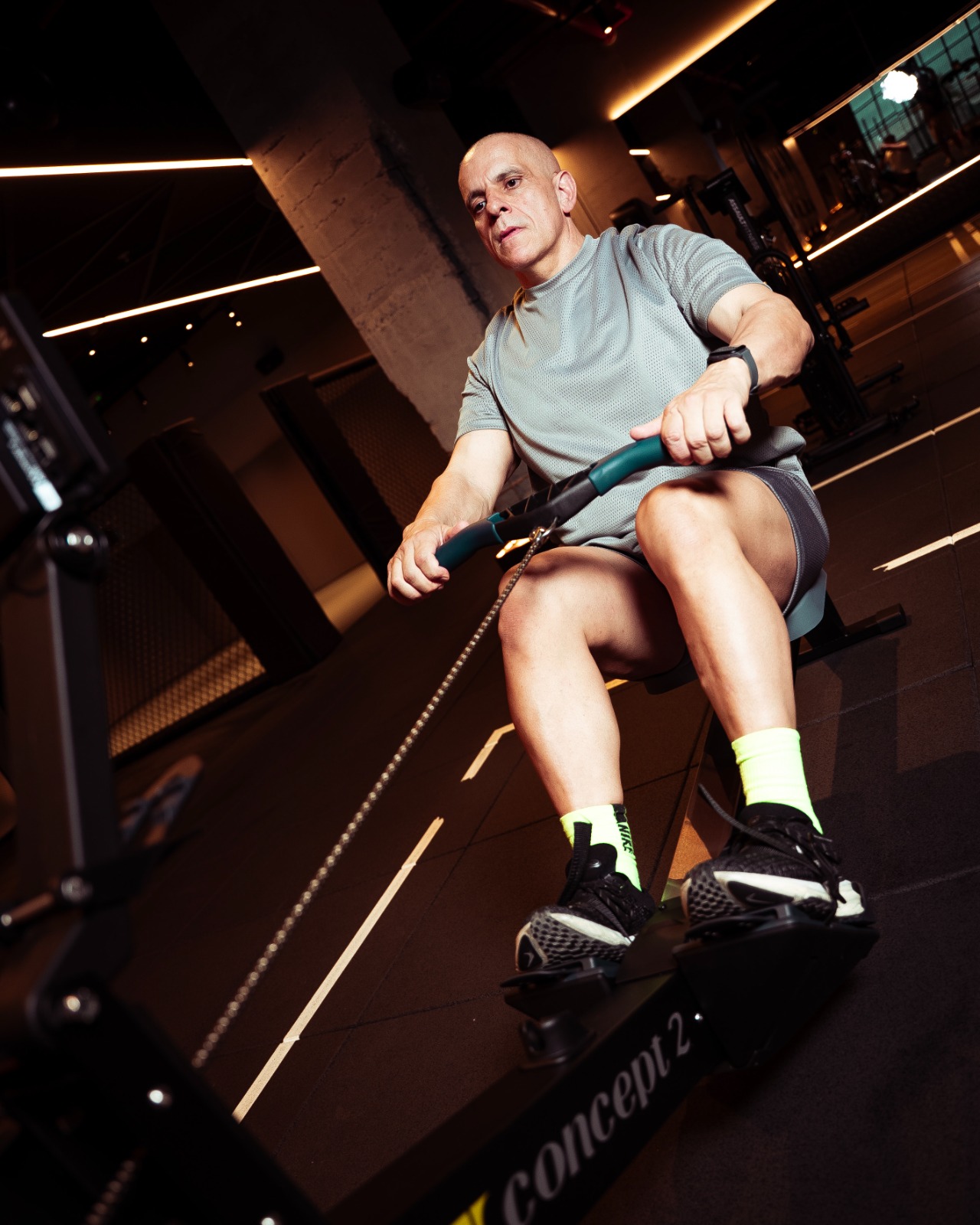 Claude Louis rowing on a Concept2 RowErg during the LockedIn 168 challenge